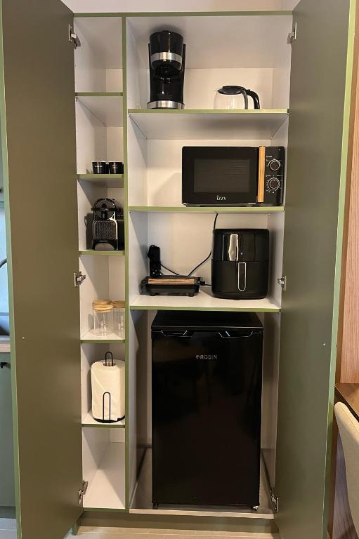 Kuchyň nebo kuchyňský kout v ubytování Munda suites
