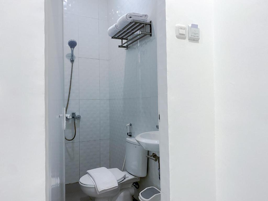 Koupelna v ubytování Cordex Hotel Marelan Medan