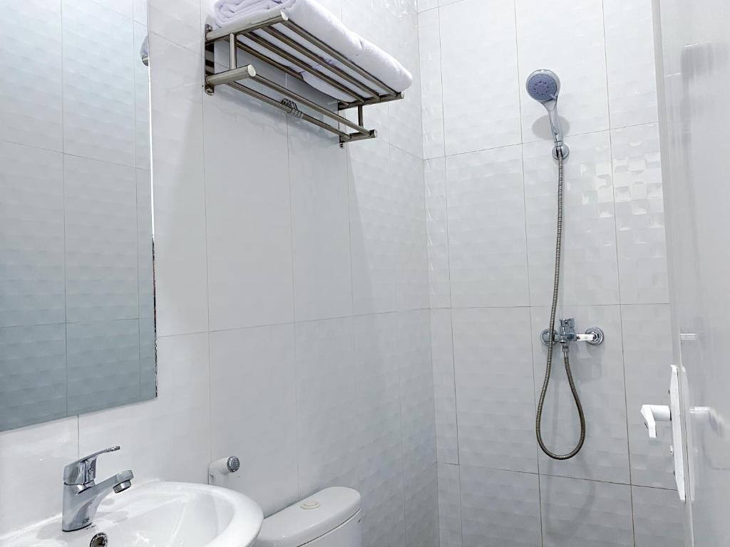 Koupelna v ubytování Cordex Hotel Marelan Medan