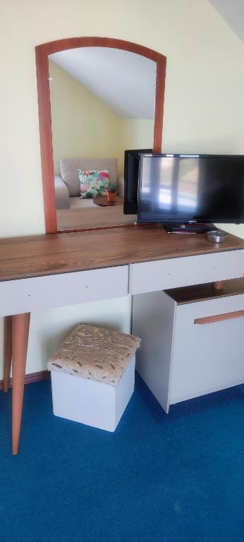TV a/nebo společenská místnost v ubytování Family hotel Neptun - Lozenets