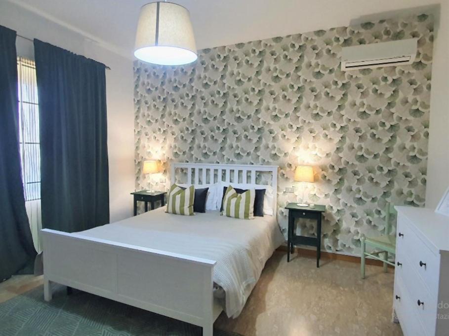 Postel nebo postele na pokoji v ubytování VILLA ROSA - Sperlonga Vertice Rooms