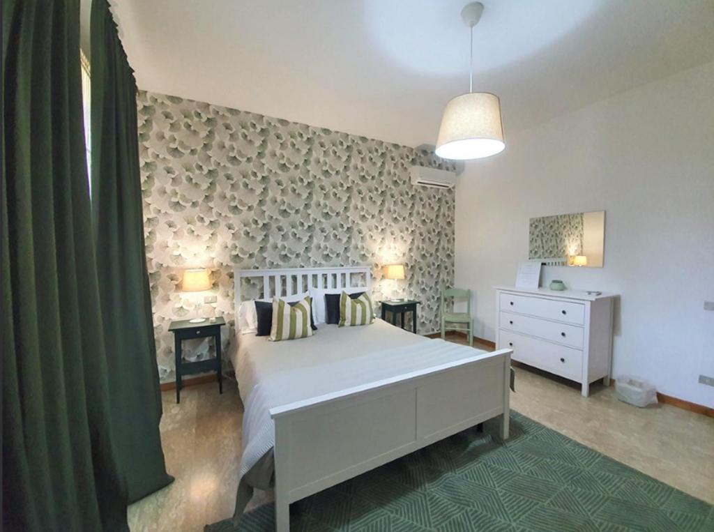 Postel nebo postele na pokoji v ubytování VILLA ROSA - Sperlonga Vertice Rooms