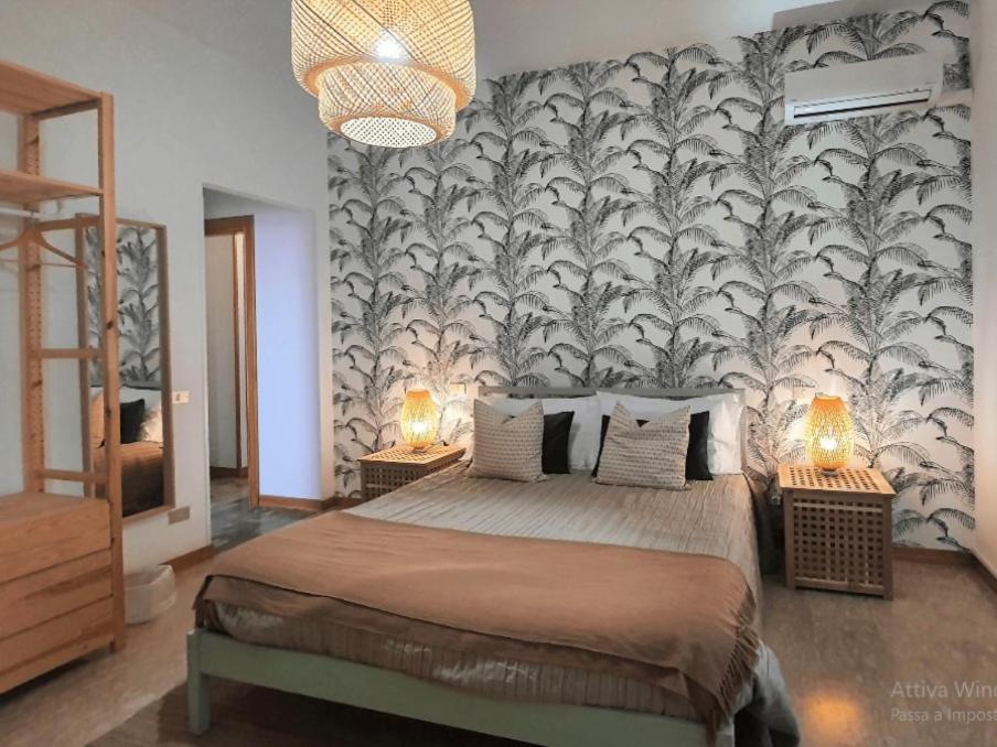 Postel nebo postele na pokoji v ubytování VILLA ROSA - Sperlonga Vertice Rooms