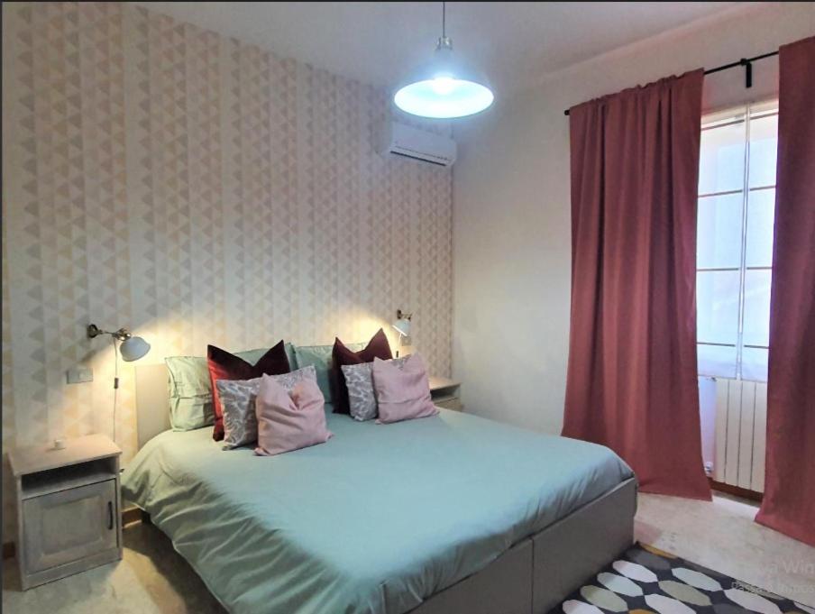Postel nebo postele na pokoji v ubytování VILLA ROSA - Sperlonga Vertice Rooms