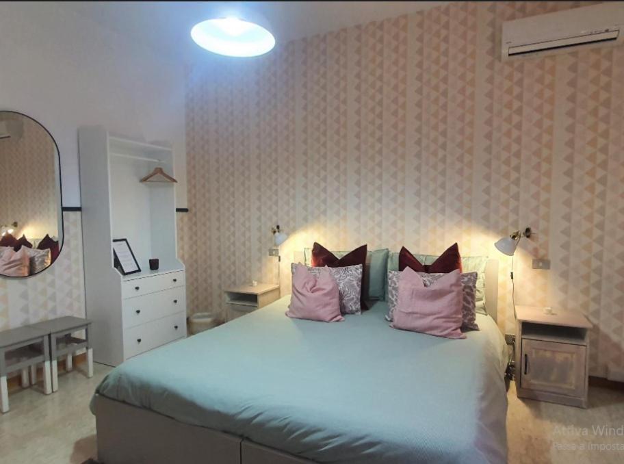 Postel nebo postele na pokoji v ubytování VILLA ROSA - Sperlonga Vertice Rooms