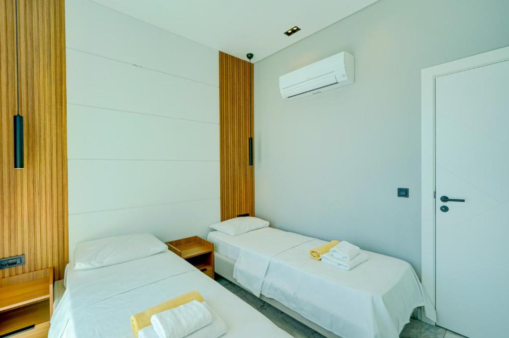 Postel nebo postele na pokoji v ubytování Villa Mars 6 - PLANET LUXURY VILLAS