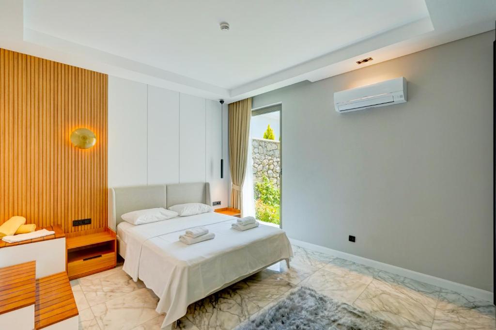 Postel nebo postele na pokoji v ubytování Villa Mars 6 - PLANET LUXURY VILLAS