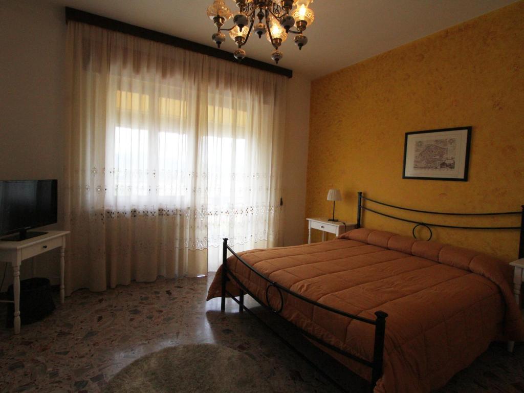 Postel nebo postele na pokoji v ubytování B&B L'Armonia