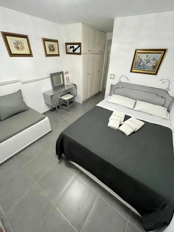 Posteľ alebo postele v izbe v ubytovaní Mykonos Secret Spot
