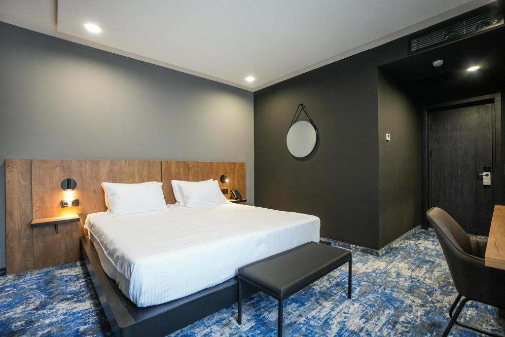 Postel nebo postele na pokoji v ubytování Hotel Splendid Tbilisi