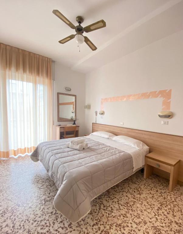 Postel nebo postele na pokoji v ubytování Hotel Ravello Adults Only
