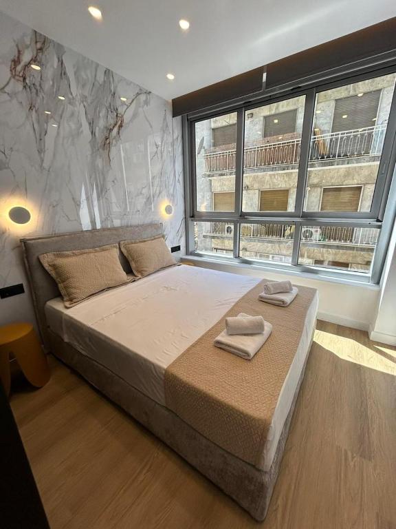 Postel nebo postele na pokoji v ubytování PortStay - Complex N71