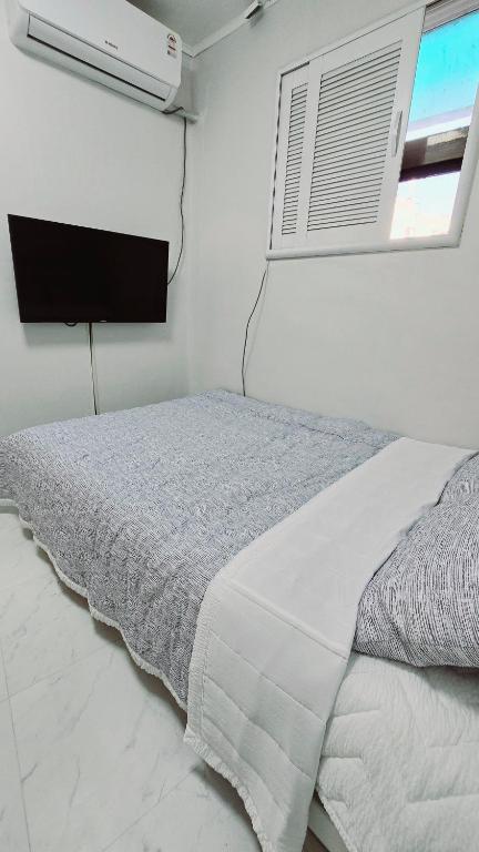 Postel nebo postele na pokoji v ubytování Time Stay