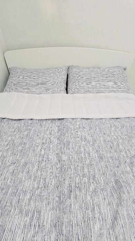 Postel nebo postele na pokoji v ubytování Time Stay