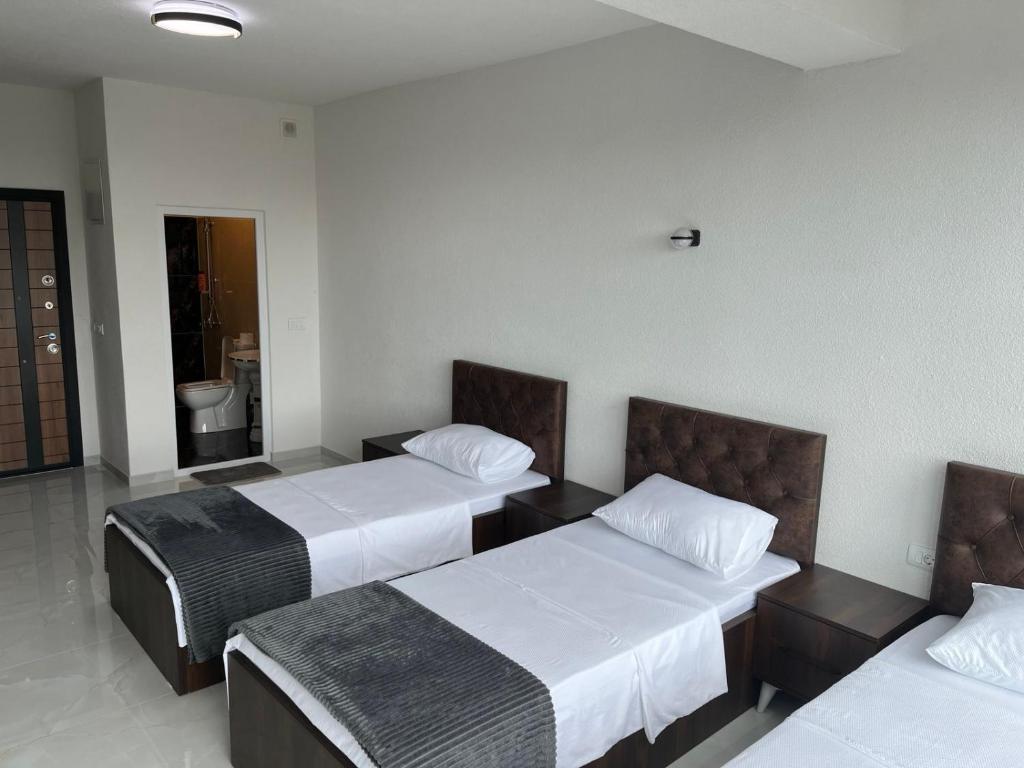 Postel nebo postele na pokoji v ubytování Hostel Jusaj Glob