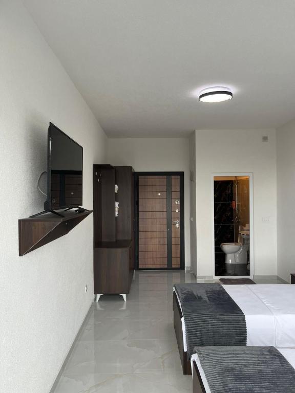 TV a/nebo společenská místnost v ubytování Hostel Jusaj Glob