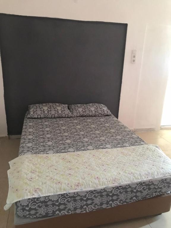 Postel nebo postele na pokoji v ubytování Huzur Pansiyon