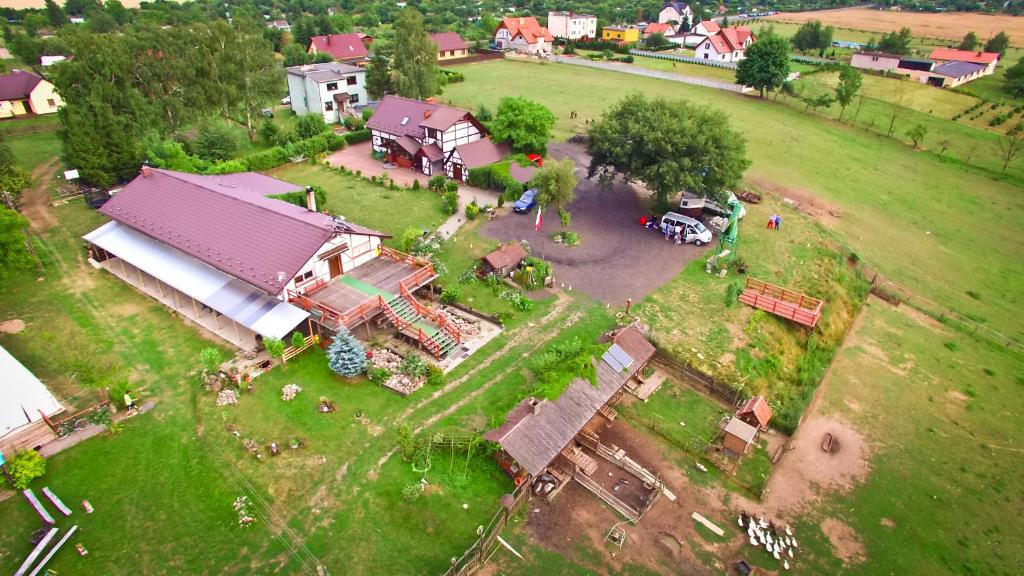 an aerial view of a large house with a yard at Agroturystyka Makowscy in Trzcianka