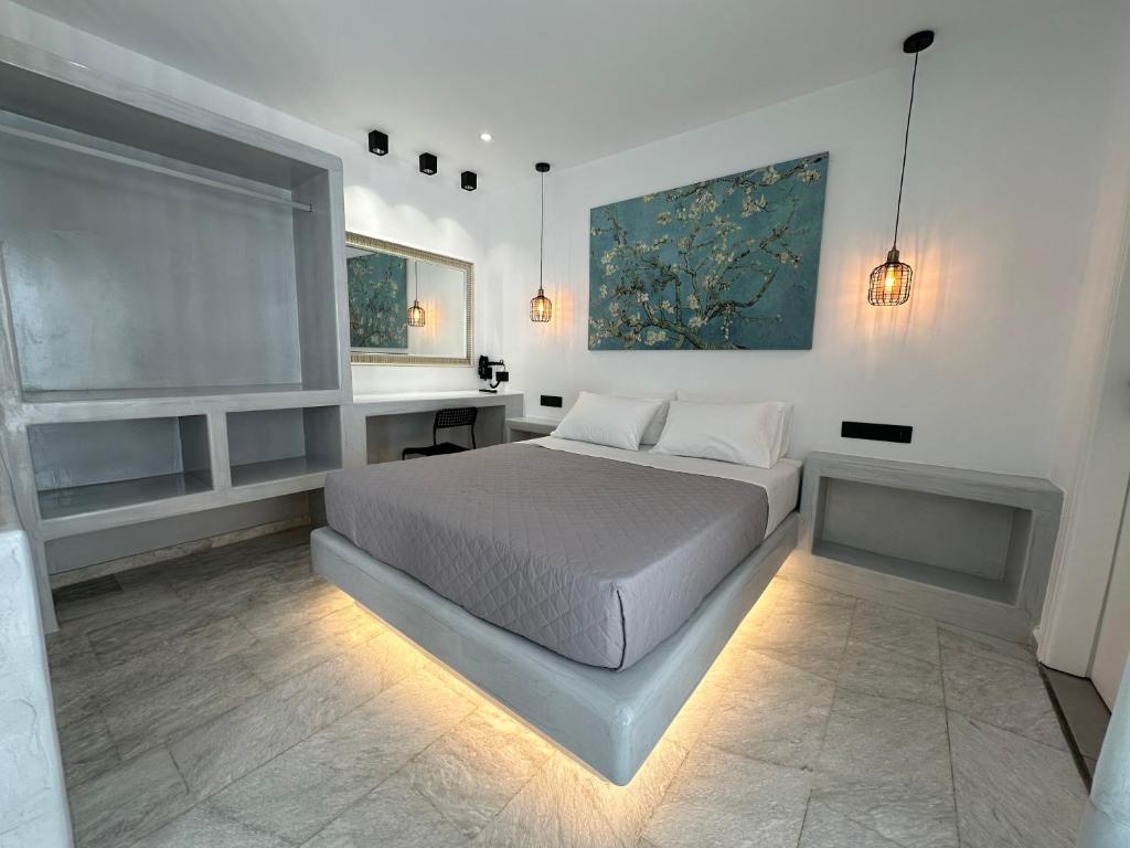 Łóżko lub łóżka w pokoju w obiekcie Aphrodite Hotel & Apartments