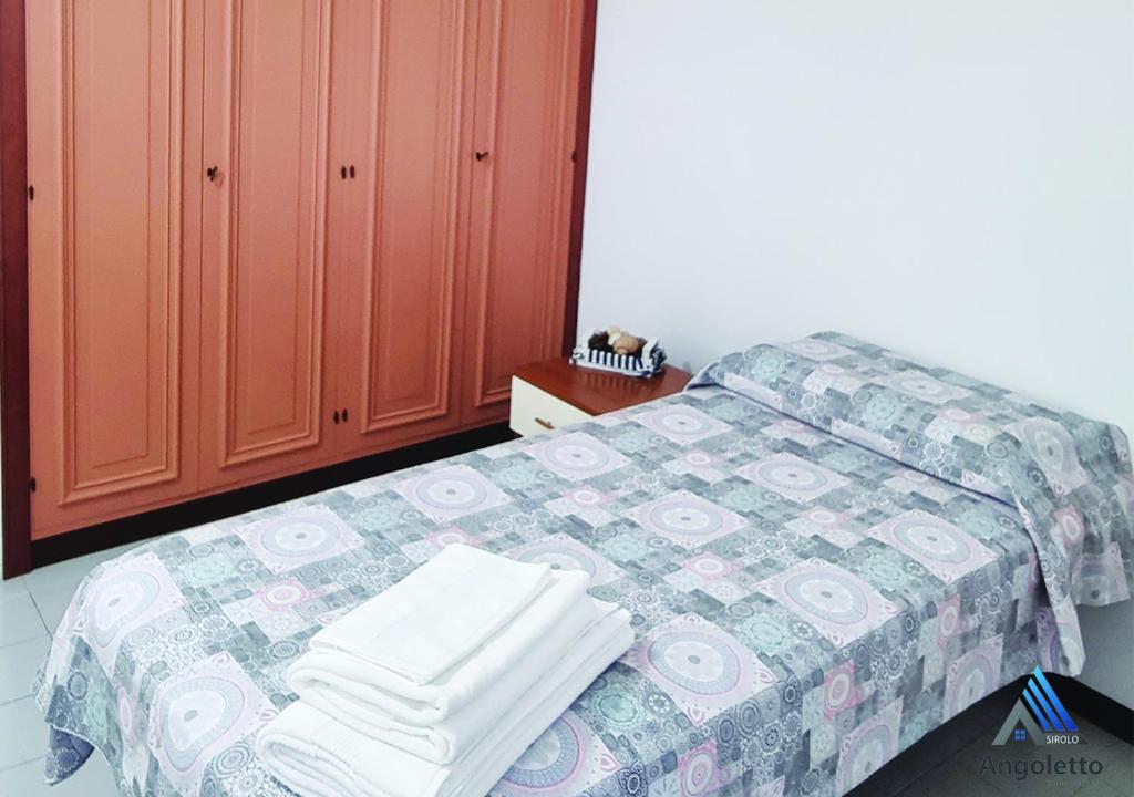 Postel nebo postele na pokoji v ubytování Angoletto Sirolo Affittacamere