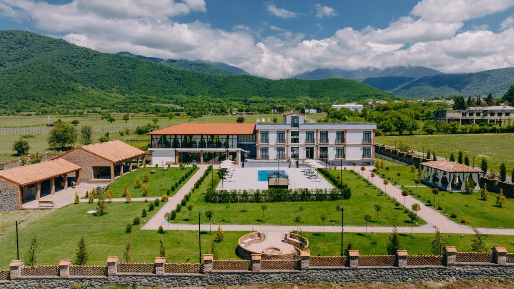 an aerial view of a large building with a garden at In Gremi Hotel in Gremi