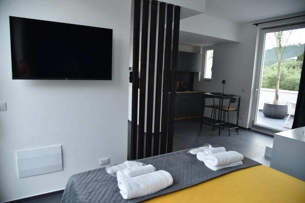 Postel nebo postele na pokoji v ubytování Palms Suites