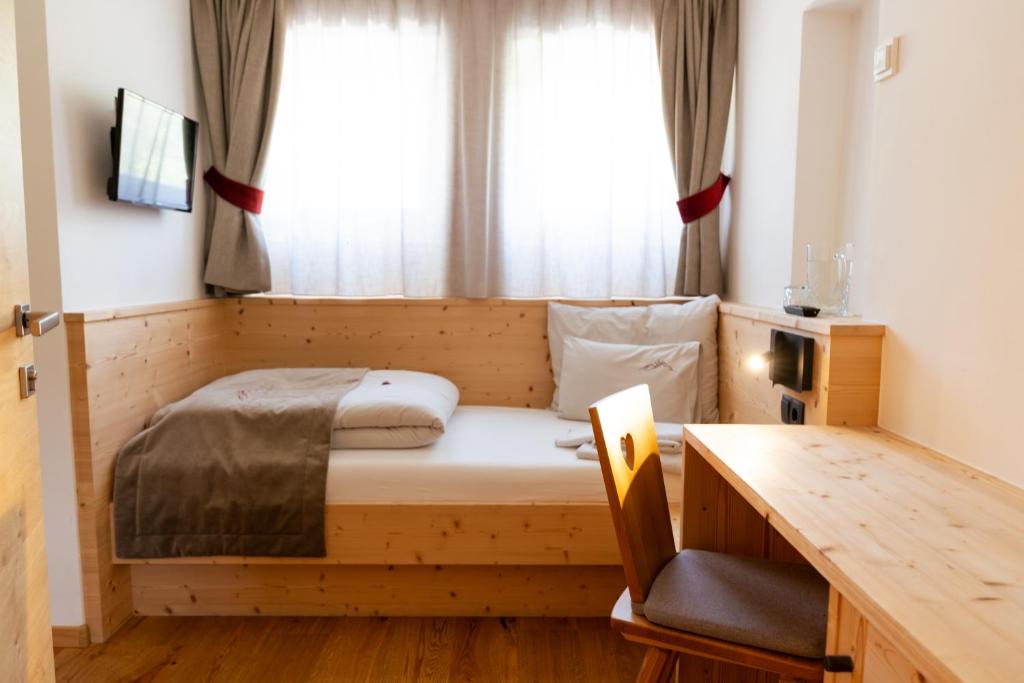 Postel nebo postele na pokoji v ubytování Garni Bergblick