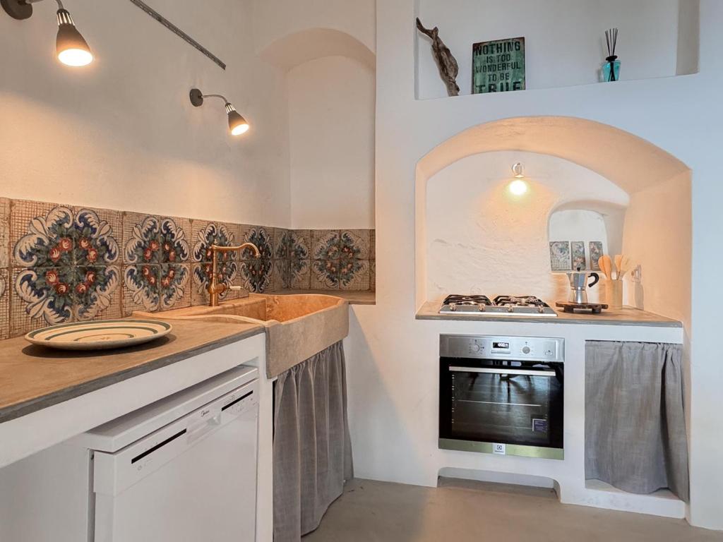 Kuchyňa alebo kuchynka v ubytovaní Casa Battiato