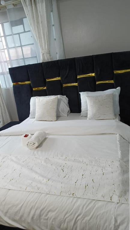 Postel nebo postele na pokoji v ubytování Juston Homes AirBNB kisii