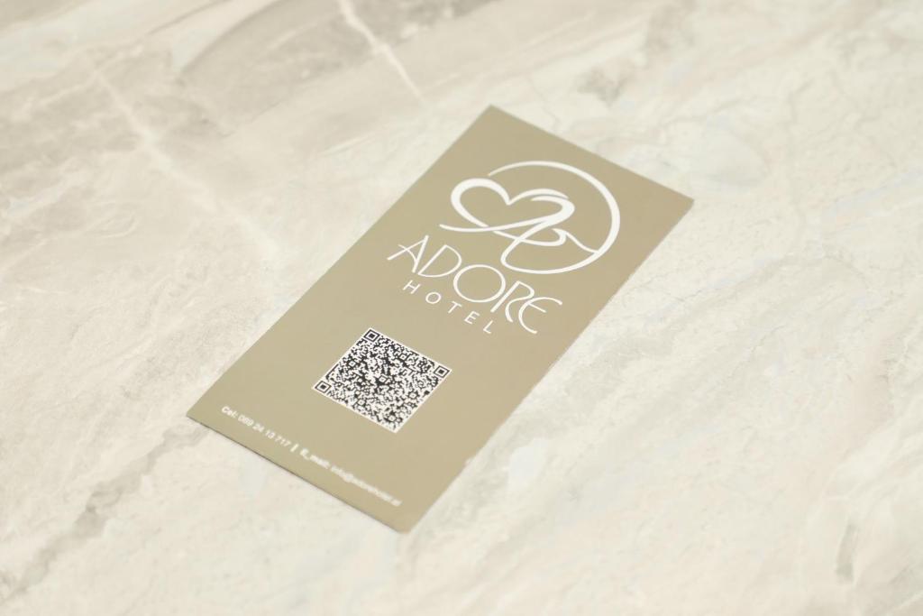 Certifikát, hodnocení, plakát nebo jiný dokument vystavený v ubytování Hotel Adore