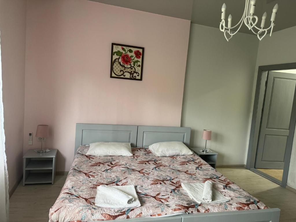 Postel nebo postele na pokoji v ubytování ЕЛІТ