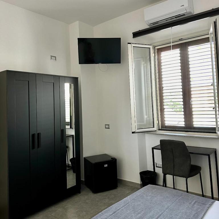 TV a/nebo společenská místnost v ubytování Grenada Home