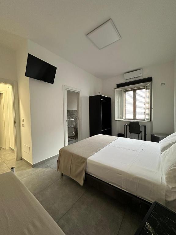 Postel nebo postele na pokoji v ubytování Grenada Home