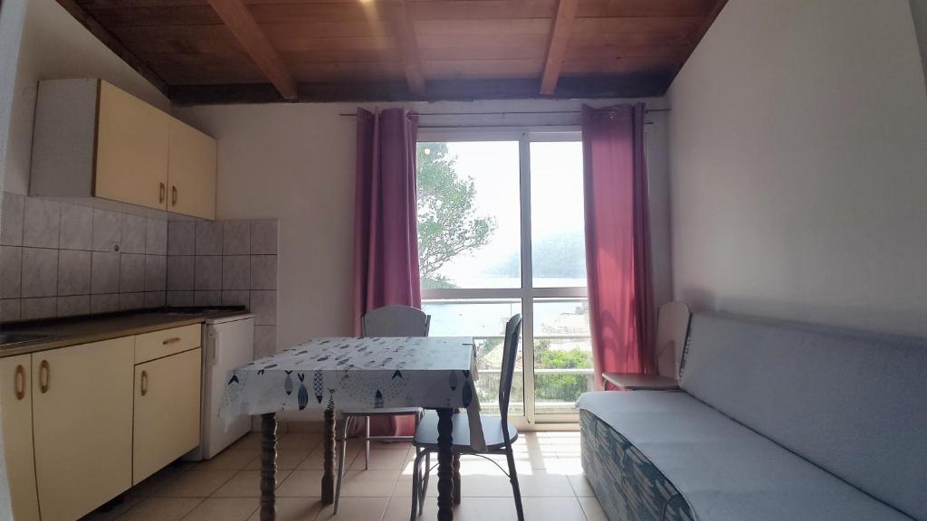 Kuchyň nebo kuchyňský kout v ubytování Villa Franić