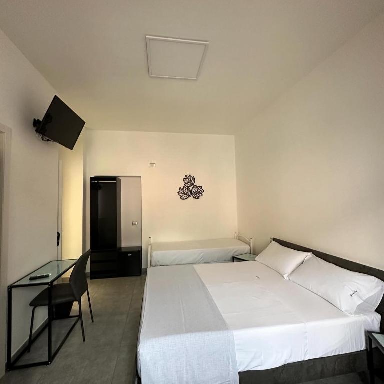 Postel nebo postele na pokoji v ubytování Grenada Home