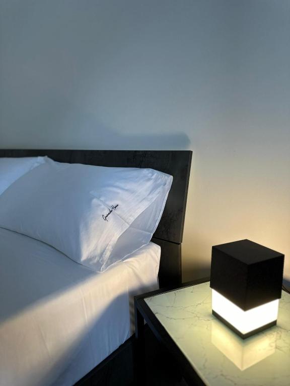 Postel nebo postele na pokoji v ubytování Grenada Home