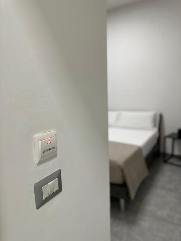 Postel nebo postele na pokoji v ubytování Grenada Home