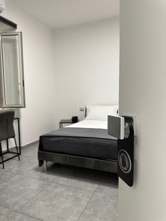 Postel nebo postele na pokoji v ubytování Grenada Home