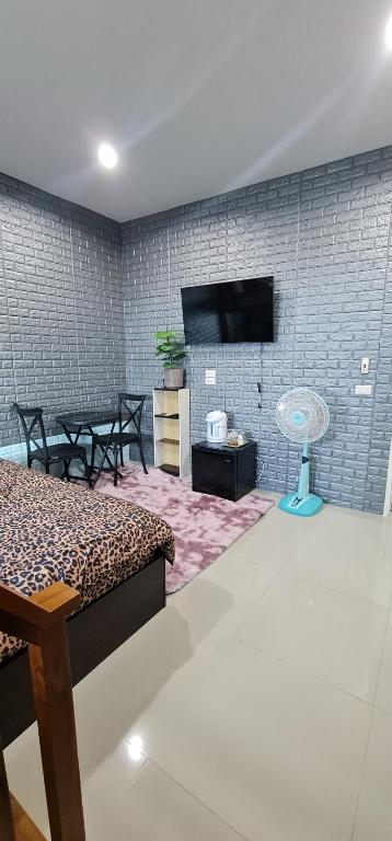 TV a/nebo společenská místnost v ubytování TM Touch Homestay