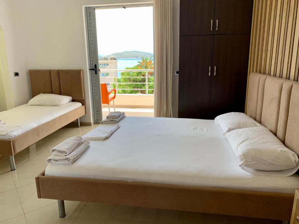 Postel nebo postele na pokoji v ubytování Hotel Piazza