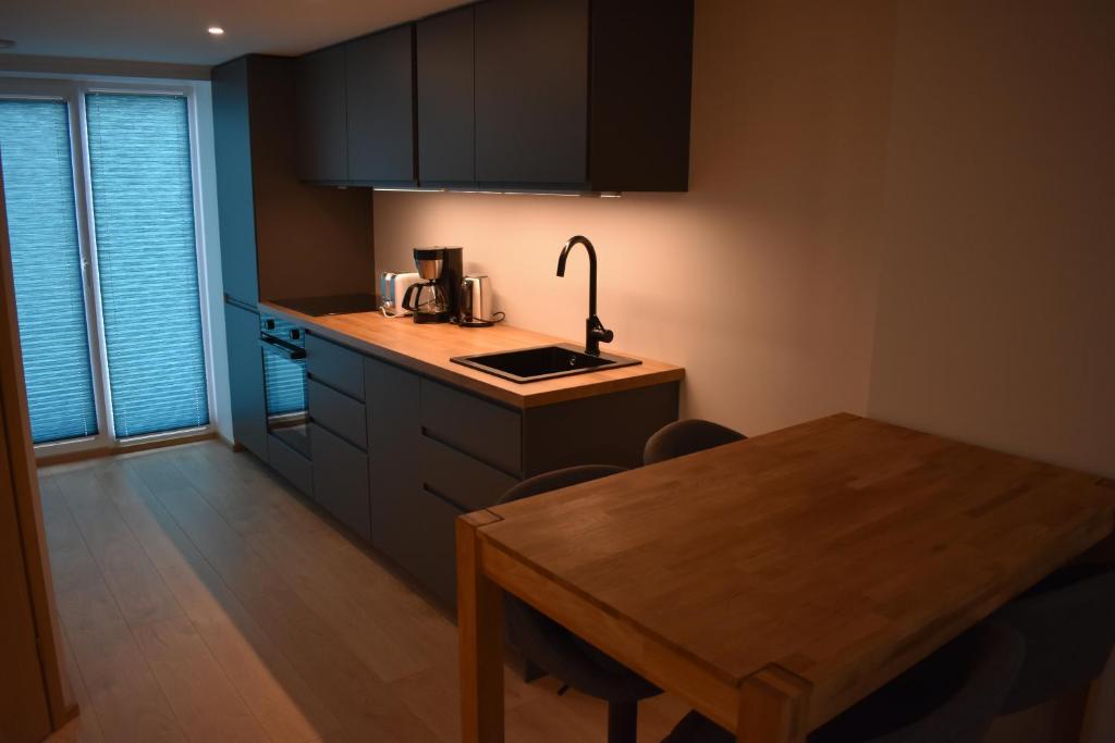 Kuchyň nebo kuchyňský kout v ubytování Suur-Posti Apartments