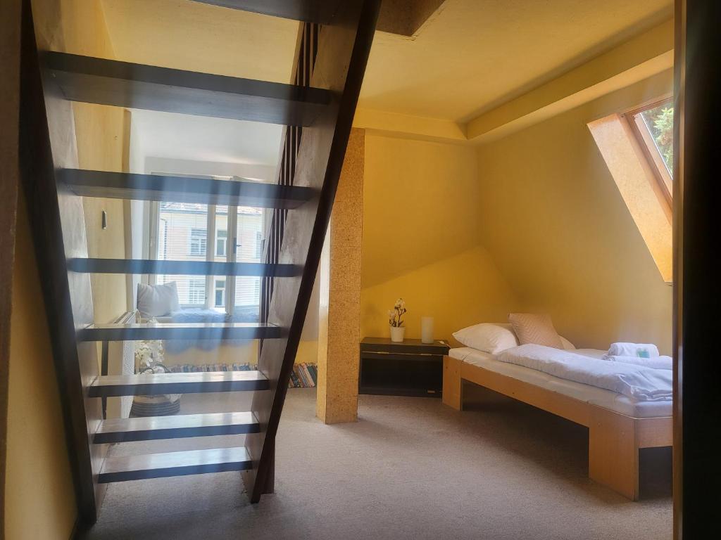 Postel nebo postele na pokoji v ubytování Hotel Lužná