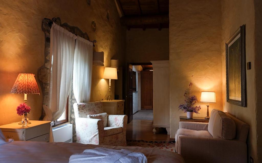 Postel nebo postele na pokoji v ubytování Relais La Magioca -Adults Only-