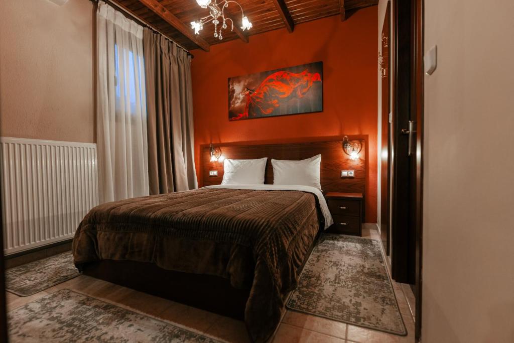 Postel nebo postele na pokoji v ubytování Villas Lirtzis