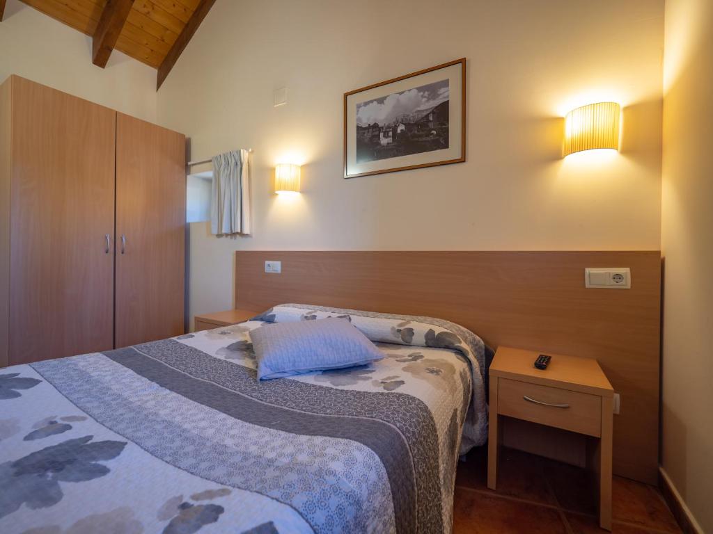 Ένα ή περισσότερα κρεβάτια σε δωμάτιο στο Casa Cambra