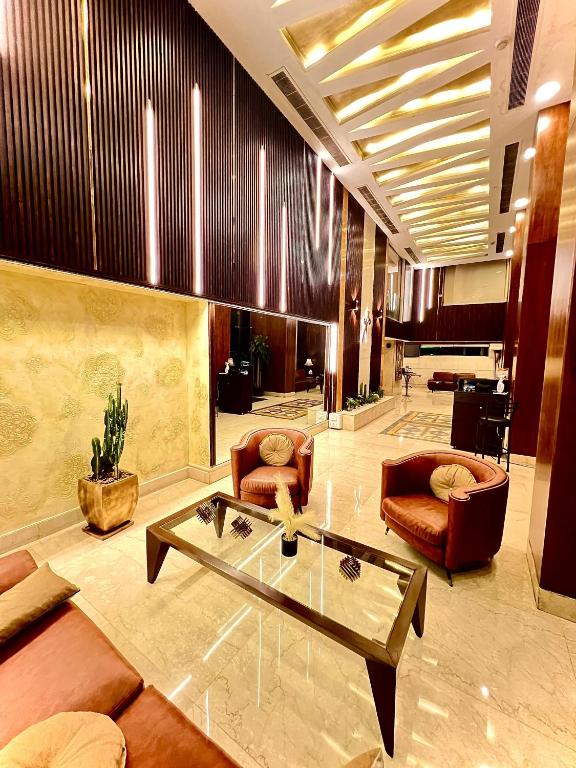 Posezení v ubytování King Suites Hotel