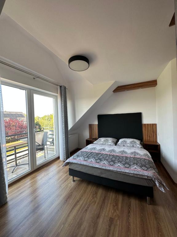 Postel nebo postele na pokoji v ubytování Holiday Amber -