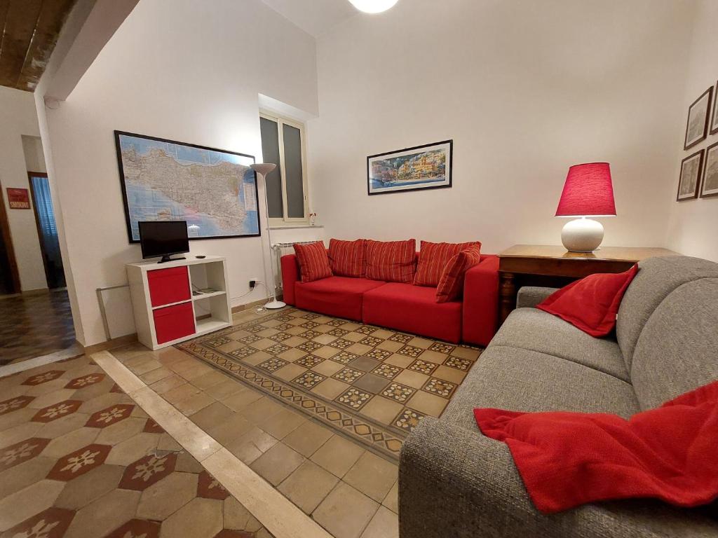 Telewizja i/lub zestaw kina domowego w obiekcie Olivuzza Apartment
