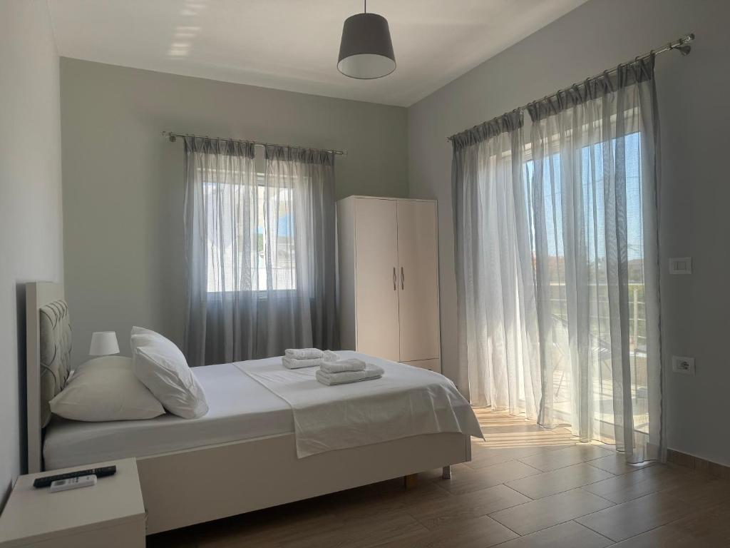 Postel nebo postele na pokoji v ubytování Villa Almando