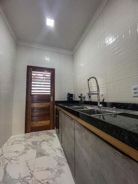 Kuchyň nebo kuchyňský kout v ubytování Life House Ubajara